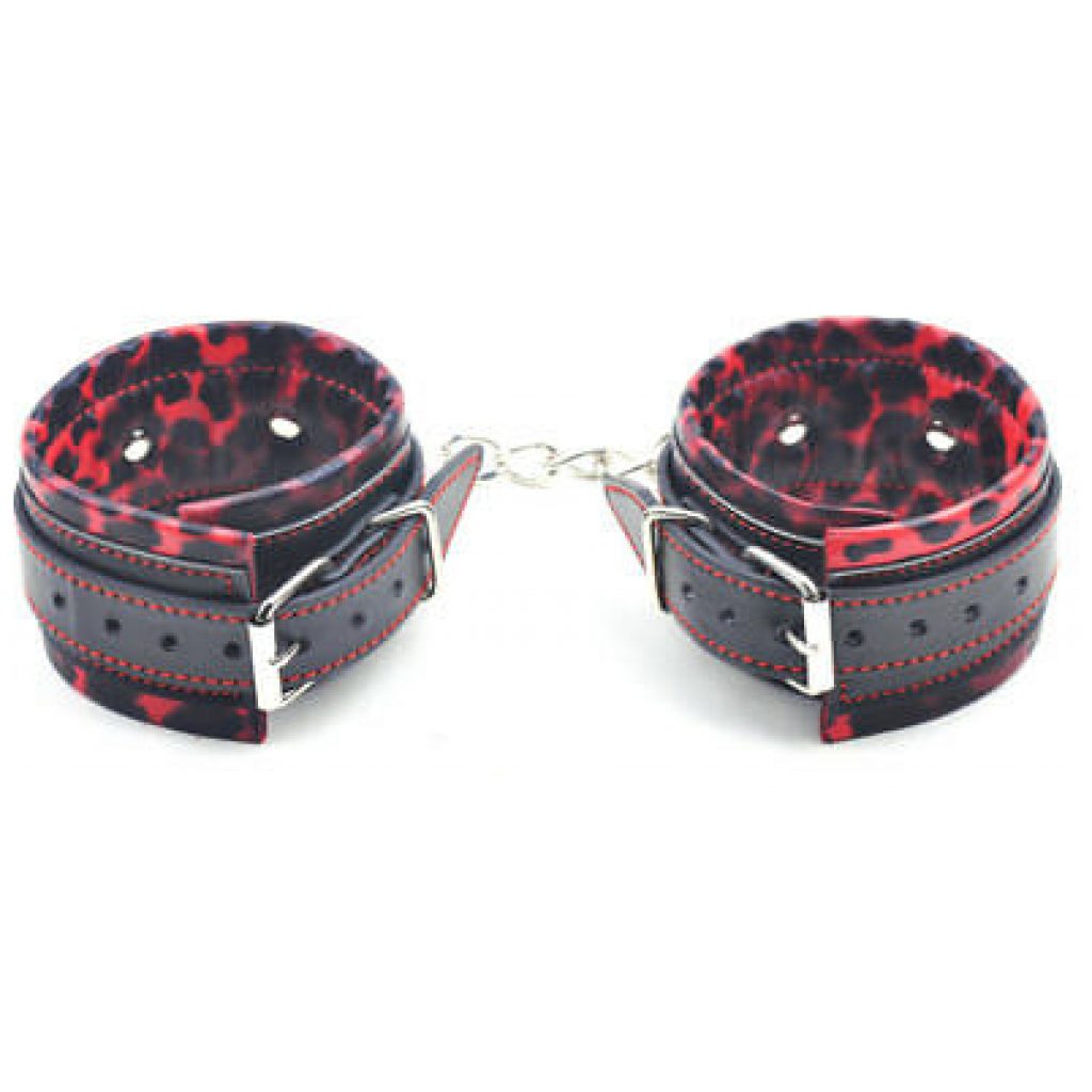Bring a wild touch to your domination games with red and black leopard cuffs.